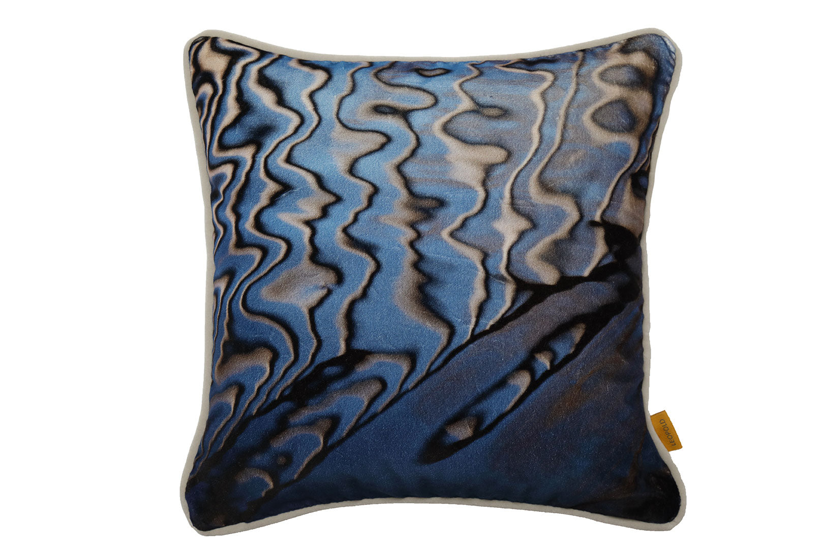 Square velvet cushion with piping featuring photo of ripples in blue water